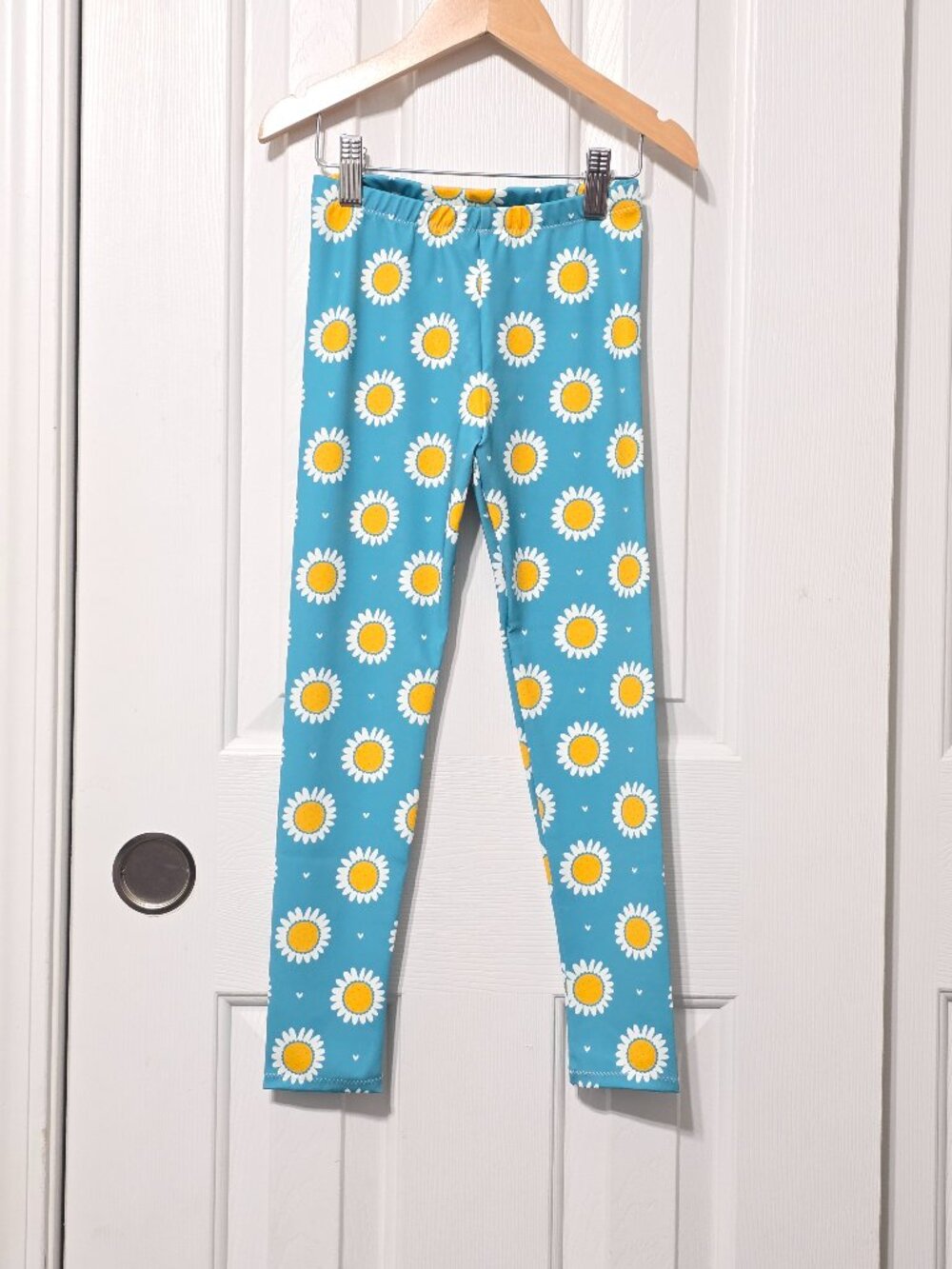 Girls daisy leggings, size 6